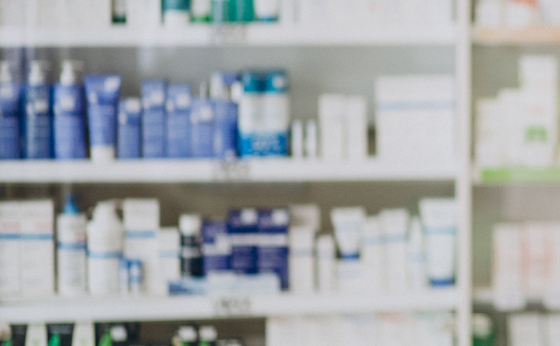 pharmacy shelves out of focus