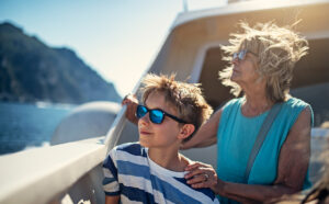 older woman and child on a boat