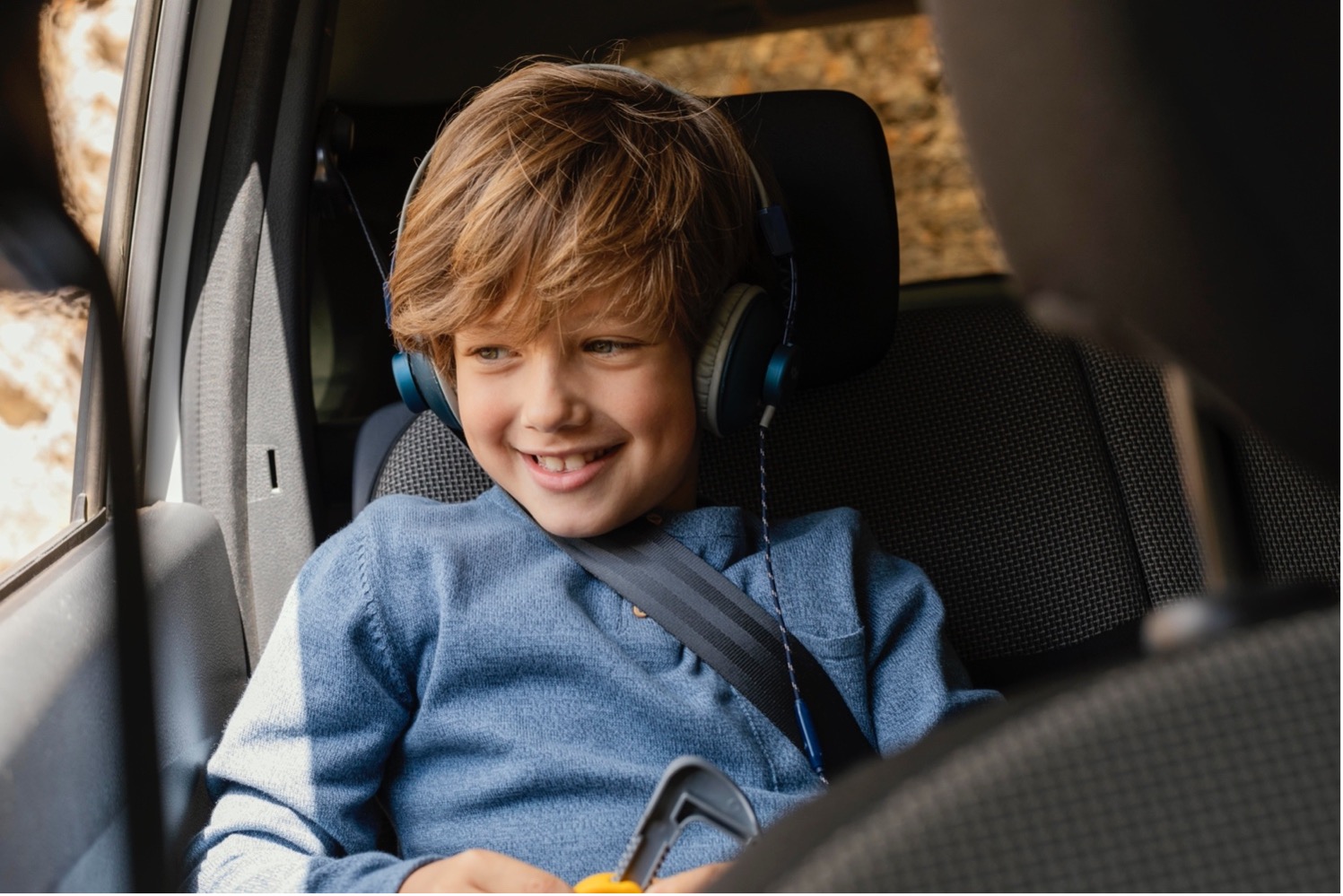 boy in car