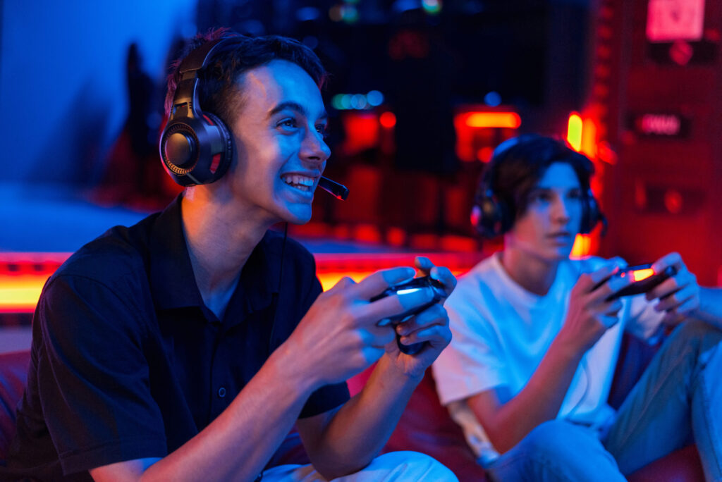 Motion Sickness & Video Games: Coping with sickness while gaming 9 Two teen friends are playing a game console