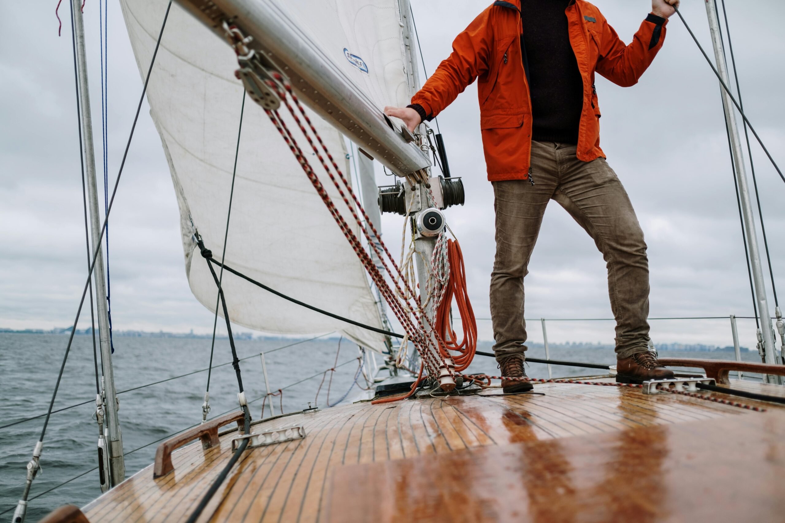 person standing on a sail boat